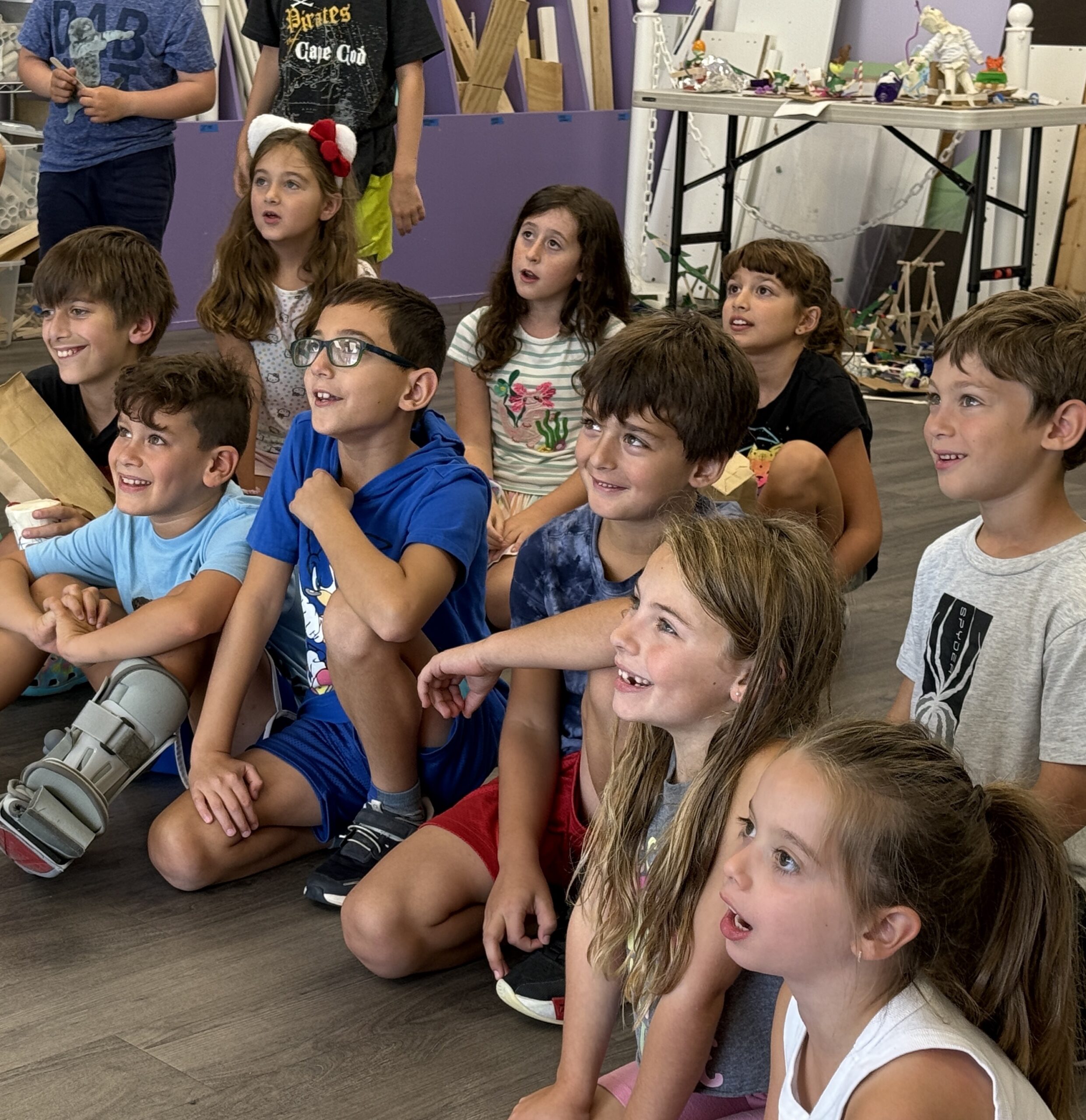 Children smiling during a STEM activity